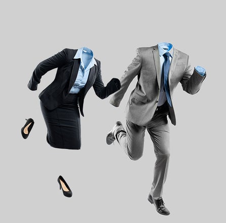 Running on empty: Two empty suits (no human bodies) in a sprint.